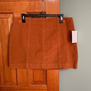 Love, fire. Mini skirt, corduroy, color rust orange, size XL. NWT